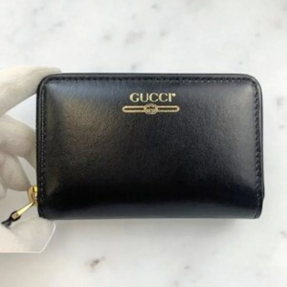 NIB Authentic Gucci zip card case wallet with gucci logo in black